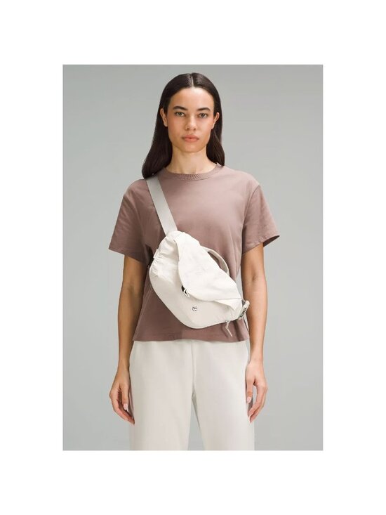 Lululemon Handbags - lululemon athletica Cream Crossbody Sling